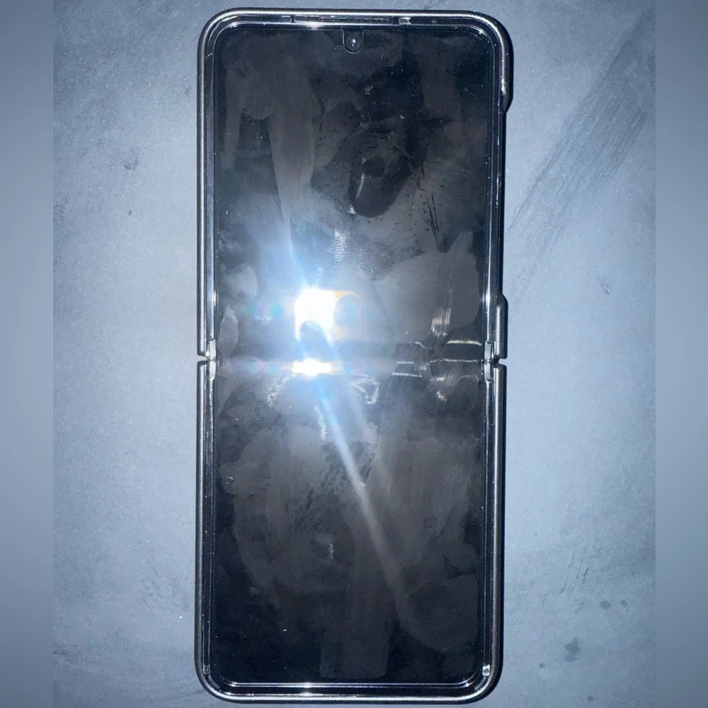 Black Foldable Smartphone with Blue Display